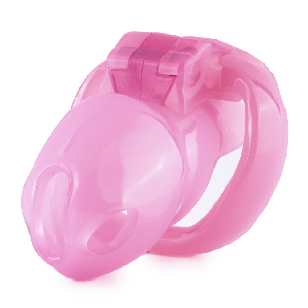 Unlock new levels of intimacy with this pink resin chastity pod. Comfortable and slightly flexible, it serves as a secure container, complete with a lock and keys. Wear discreetly or pair with a necklace for added allure the key to elevating your experience.
