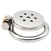 Inverted chastity device crafted from steel enhances control by incorporating anal stimulation via plug. Perfect for ruin scenarios, combining electrosex with a sleek, flat, discreet style.