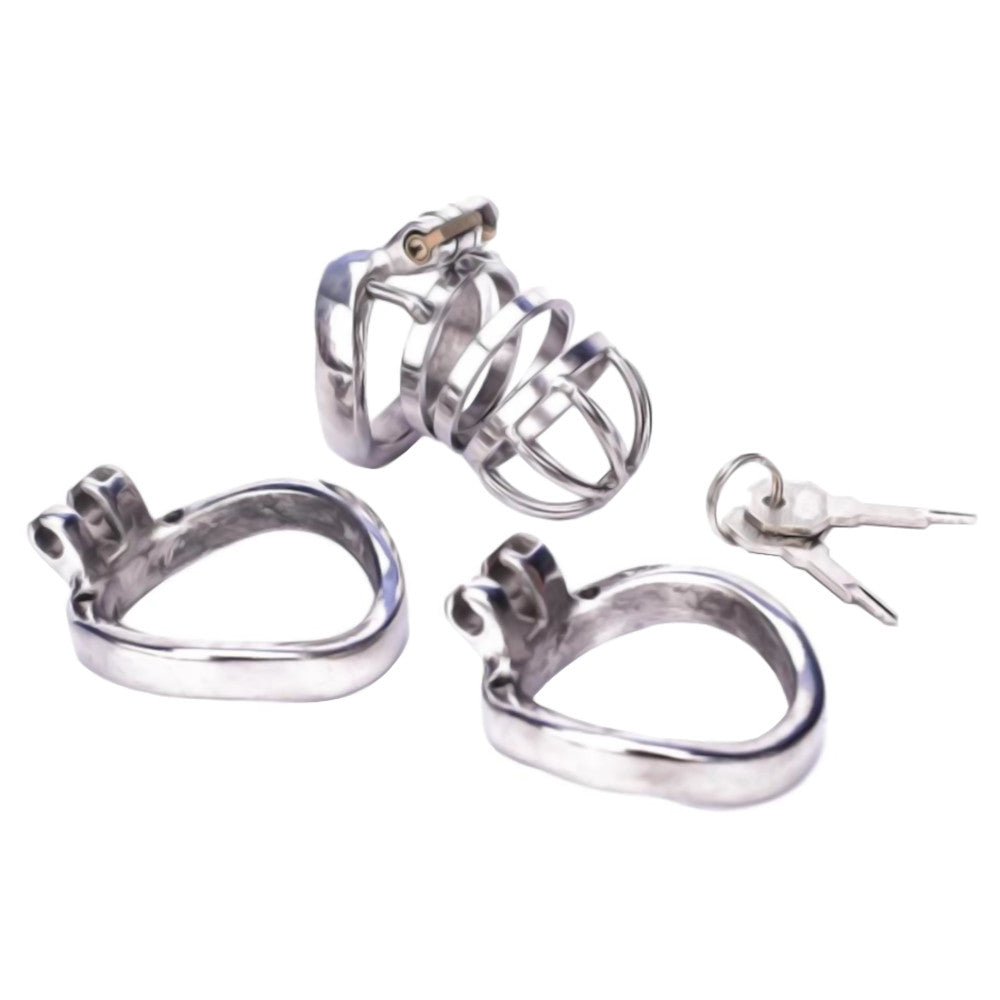 Merciless Chastity Enforcer: a metal cock cage for the daring sounding male. On your knees, shaved and brushed clean, your control is stripped away. Don't let desires rot; embrace merciless chastity.