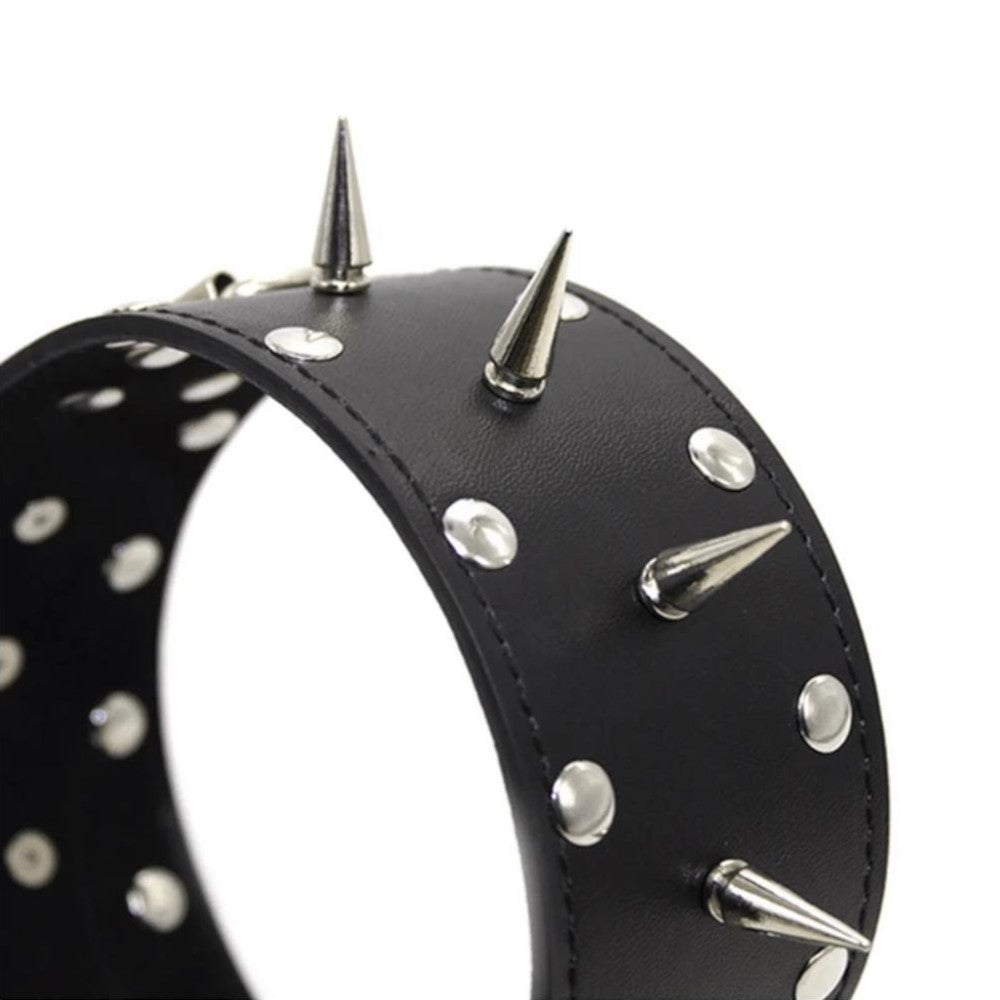 Shock the ordinary by wearing our Punky Black Male Chastity Collar With Leash at your next event. This edgy collar, compatible with the Cagink device, is perfect for making a bold statement at a wedding or any occasion.
