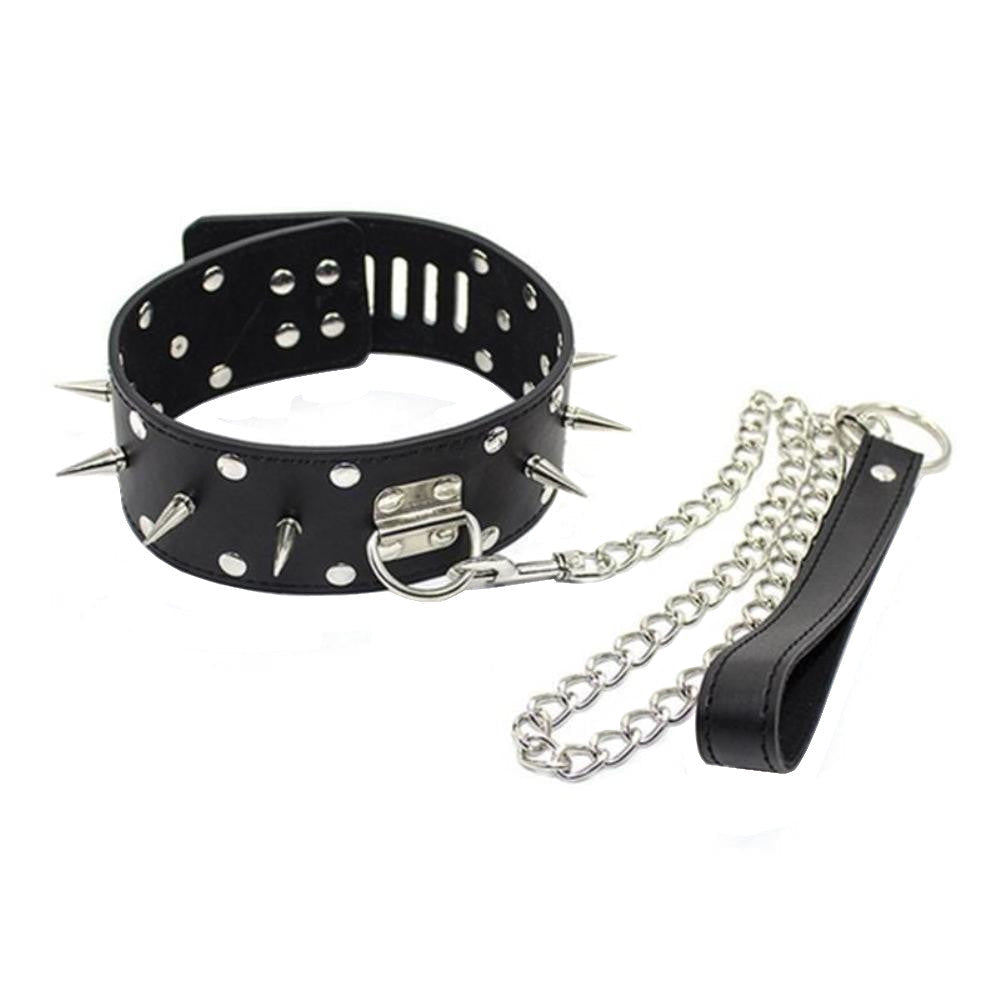 Dominate your slave with this punky black collar and leash, featuring chastity cage spikes and unbreakable rivets. Even Houdini couldn't escape! Crafted with surgical precision see pics of this edgy accessory now.