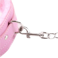 Unleash your inner kitty with this pink collar that wears like a dream, making points for style! Perfect for sissies in a chastity cage or a male chastity belt. Meow-tastic transformation!