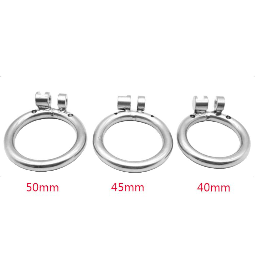 With robust silver metal construction, this metal penis cage secures your cuckold dick, transforming you into a willing prisoner to queens, held firmly as your desires simmer.